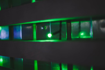 so many green lanterns on the wall at night
