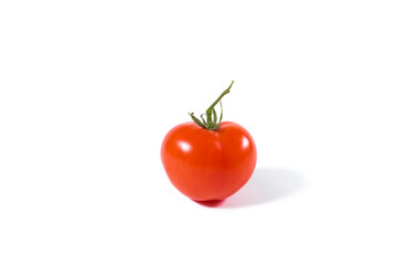 One red tomato isolated on white