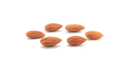 Group Almonds isolated on white.