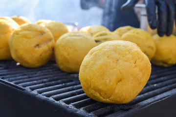 Balls of polenta and cheese in the middle of it, named bulz, a traditional romanian dish.