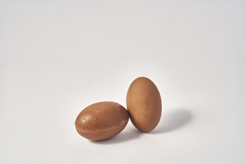 chocolate eggs on white background