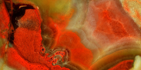 The surface of the onyx stone. Polnoratsionny stone, a variety of agate in green, yellow tones