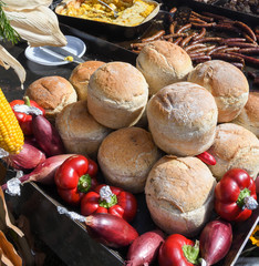Homemade traditional buns of bread, authentic rustic recipe on counter top during food festival