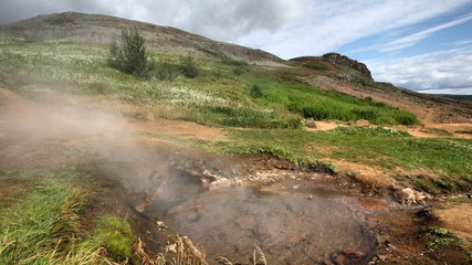 Hot spring in Iceland - mountains of Geysir