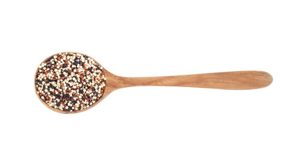 Quinoa in wooden spoon isolated on white background, health care concept