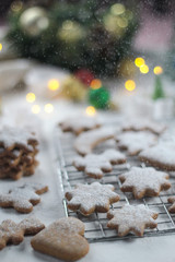 Christmas new year background with gingerbread and powdered sugar diet food diet coocies with ginger