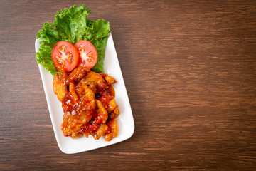 Fried fish topped with 3 flavors chili sauce