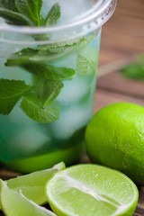 fresh green lime with mint ice ingredients for mohito