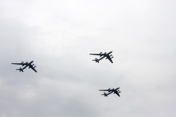 Fototapeta Combat aircraft fly in formation on May 9 Victory Parade obraz