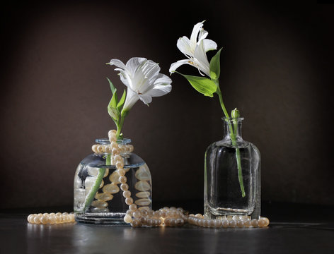 Flowers and string of pearls