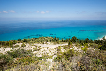 Narrow local mountain road with a sea view