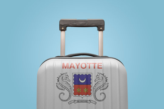 Baggage with Mayotte flag print tourism and vacation concept. - Powered by Adobe