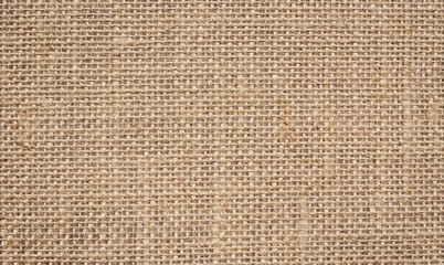 Light brown linen background Weaving Canvas Fabric Texture background. or Natural brown cloth surface .