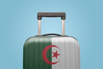 Baggage with Algeria flag print tourism and vacation concept.