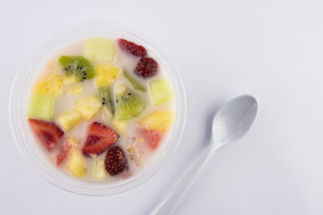 Fresh fruit soup. mix the fruit with milk and sugar sauce.