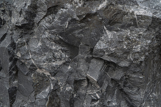 Gold antimony ore texture close-up. Siberian natural resources deposit.