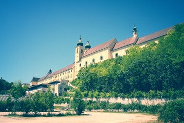 Naklejka premium Austria - Lambach monastery. Retro color filtered style.