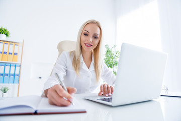 Portrait of her she nice-looking attractive cheerful focused experienced girl doc writing notes...