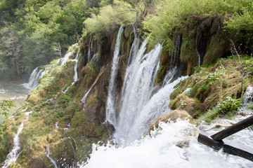 Small waterfalls, in the Plitvice Lakes Nature Park, forest reserve located in central Croatia, Europe.