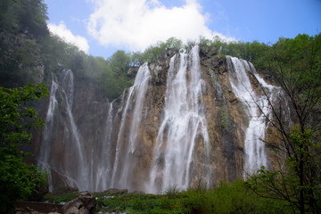 Large waterfall, in the Plitvice Lakes Nature Park, forest reserve located in central Croatia, Europe.