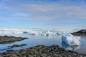  Antarctic landscape with mountains and reflection