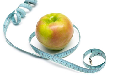 apple with old blue measuring tape on a white background