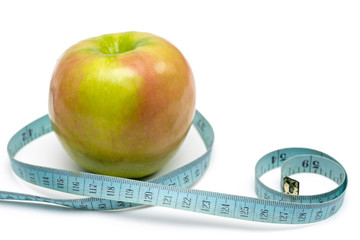 apple with old blue measuring tape on a white background