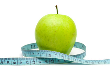 apple with old blue measuring tape on a white background