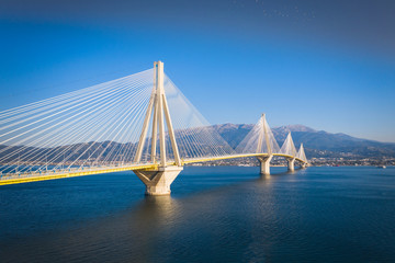 Fototapeta na wymiar Suspension bridge crossing Corinth Gulf strait, Greece. Is the world's second longest cable-stayed bridge