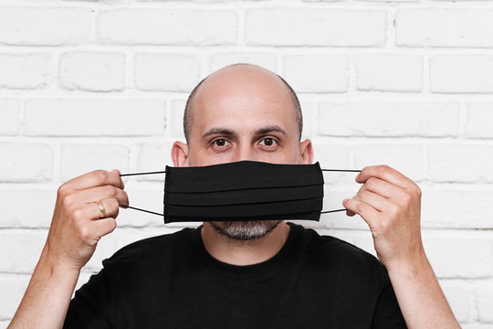 Man Wearing Black Cotton Protective Mask