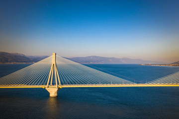 Fototapeta premium Suspension bridge crossing Corinth Gulf strait, Greece. Is the world's second longest cable-stayed bridge