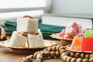 Turkish delight sweets on a metal oriental plate close up