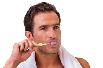 Cutout of man brushing his teeth while looking in to the mirror