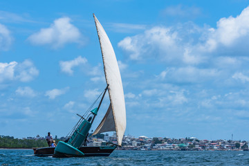 
An old Sailing Boat in Lamu Kenya.  Its participating in an annual race during the culture celebrations held once a year. Captured while taking a turn on one of the marks