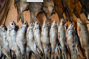 Several dried fish stew are lying on counter