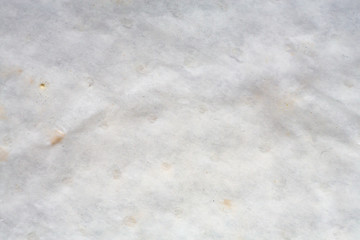 Old & Dirty piece of mulberry paper sheet or card on white background, Close up and Macro shot,  Memory note concept