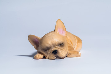 miniature figures of sleeping dog