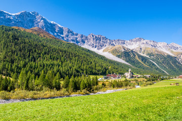 Looking at Sulden (Italian: Solda), a mountain village in South Tyrol on a sunny September day. Sulden (1,900 m) lies at the foot of the Ortler, in the Vinschgau valley east of the Stelvio Pass.