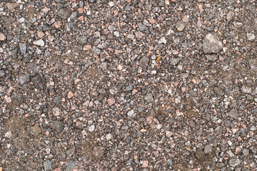 Ground with grey granite stone earth texture. Natural earth material.