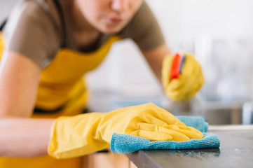 Close-up adult cleaning with rag. Home clean