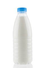 Plastic milk bottle close up on white background