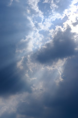 Sunbeam, sunlight through the haze, cloud on the blue sky . Cloud with sun ray.