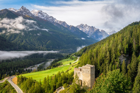 Silvretta Alps surrounding the village of Ramosch (Val Sinestra, Graub&uuml;nden, Switzerland). It lies in the Lower Engadin valley along the Inn River, and is famous for its 12th-century Tschan&uuml;ff Castle