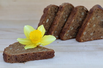 Healthy eating Sliced rye bread on a wooden background