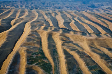 Top drone view of Mountainous terrain. Dunes. Scenic landscape.