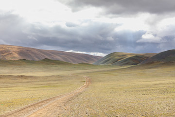 Obraz premium Typical landscapes of Mongolia. mountain slopes and valleys. Altai, Mongolia