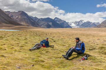Fototapeta premium Altai, Mongolia - June 14, 2017: Tourists enjoy beautiful views of the mountains of the Mongolian Altai.