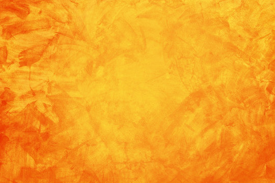 yellow and orange grunge texture cement or concrete wall banner, blank background © khwanchai