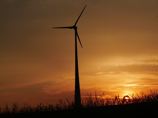 wind turbine at sundown