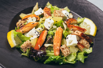 tasty salmon salad served on plate